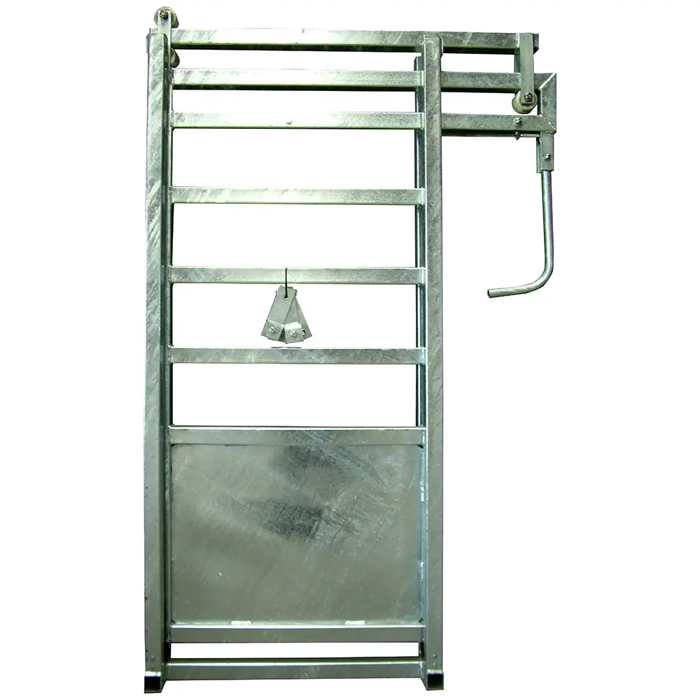 A heavy-duty sliding gate in a cattle race